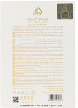 Tył beżowego opakowania Lattafa Bade'e Al Oud Eau de Parfum 100ml, z wielojęzycznymi ostrzeżeniami.