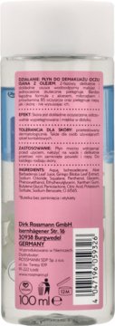 Tył przezroczystej butelki płynu Isana do demakijażu oczu z olejem 100ml, z różową etykietą i kodem.