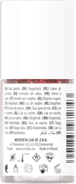 Tył brokatowego czerwonego lakieru Semilac w butelce, z etykietą zawierającą tekst w wielu językach i symbole.