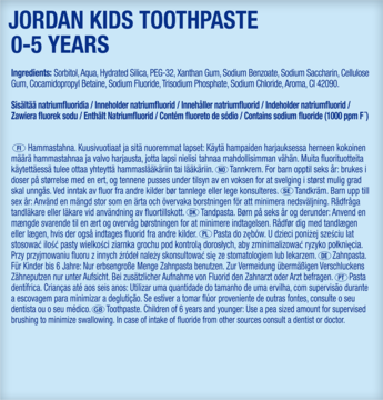 Niebieska etykieta pasty Jordan Kids Toothpaste 0-5 Years, widoczne informacje o składzie i fluorze 1000 ppm.