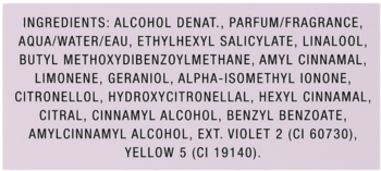 Lista składników kosmetyku: alkohol, woda, zapach, barwniki, na jasnofioletowym tle.
