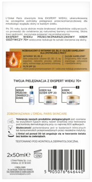 Tył czarnego opakowania L'Oréal Ekspert Wieku 70+, kremów z witaminami B5, E i olejkiem kameliowym.
