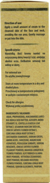 Tył opakowania kremu pro-age do twarzy, beżowe pudełko z instrukcją użycia i listą składników.