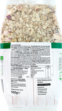 Tył przezroczystego opakowania Musli Bricher 500g, widoczna mieszanka płatków, owoców i orzechów, biała etykieta.