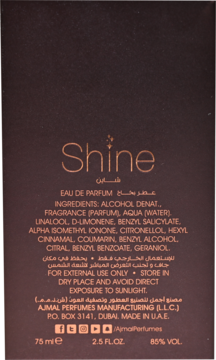 Tył ciemnobrązowego opakowania damskiej wody perfumowanej Ajmal Shine z listą składników i danymi producenta.