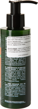 Tył ciemnozielonej butelki kremu do loków z pompką, biała etykieta z polskim opisem składników.