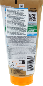 Tył beżowej tubki mleczka do opalania SPF 50+ z ceramidami, z pomarańczową nakrętką i listą składników.
