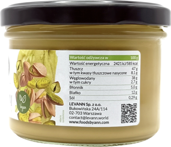Tył słoika kremu pistacjowego Foods by Ann, etykieta z tabelą odżywczą, logo vegan, czarna pokrywka.