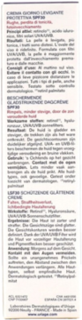 Biała boczna ściana opakowania kremu na dzień SPF30 z retinolem, zawiera tekstowe opisy produktu.