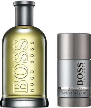 Zestaw Hugo Boss Bottled: bursztynowa woda toaletowa i srebrny dezodorant w sztyfcie, oba stojące pionowo, widok z przodu.