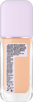 Tył butelki podkładu Maybelline Super Stay Lumi-Matte, jasnobeżowy płyn, blady fioletowy korek, napisy o formule z aminokwasami.