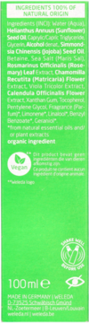 Tył zielonej butelki Weleda Skin Food Dwufazowy Olejek, prezentujący listę składnikw 100% naturalnego pochodzenia.