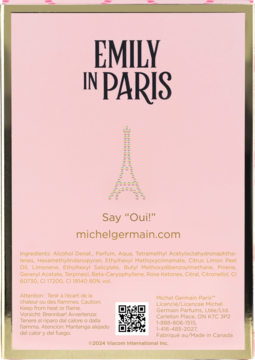 Tył różowego opakowania wody perfumowanej Emily in Paris Michel Germain z napisem, składem, QR kodem i wieżą Eiffla.