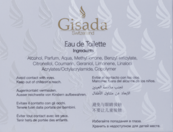 Zbliżenie szarej etykiety wody toaletowej Gisada Donna. Widoczne złote logo, składniki oraz ostrzeżenia.