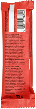 Tył czerwonego opakowania batona energetycznego Foods by Ann Cherry in Chocolate 35g, widoczny kod kreskowy i skład.