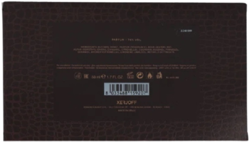 Tył opakowania perfum Xerjoff Golden Moka, ciemnobrązowe, z fakturą imitującą skórę aligatora i widocznym kodem kreskowym.