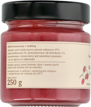 Tył szklanego słoika z miodem malinowym. Widoczna jasna etykieta ze składem, sposobem użycia i wagą netto 250g.