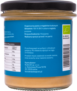 Tył słoika BIO pasty z prażonych migdałów łuskanych Ekogram, etykieta ze składem i krajem Hiszpania.