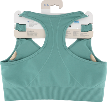 Miętowy biustonosz sportowy bezszwowy z tyłem racerback, zaprezentowany na tekturce opakowania.