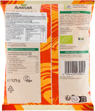 Tył torebki Alnatura przekąska kukurydziana łagodna salsa: pomarańczowy wzór, zielone etykiety, wartości odżywcze, kod kreskowy.