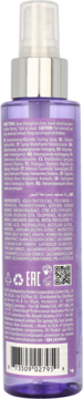 Tył przezroczystej fioletowej butelki Alterna Caviar Anti-Aging Multiplying Volume z etykietami i kodem kreskowym.