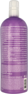 Tył fioletowej butelki Alterna Caviar Anti-Aging Multiplying Volume Conditioner z białym korkiem, widoczne informacje.