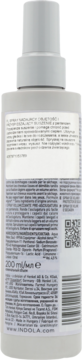 Tył białej butelki Indola Volume & Blow-Dry Spray 200 ml, z etykietą opisującą skład i kod QR.