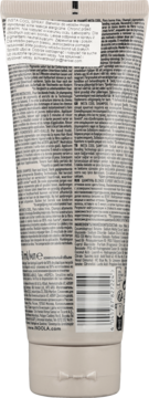 Tył opakowania szamponu neutralizującego żółty kolor Indola Blonde Expert Insta Cool. Jasnobeżowa tubka z tekstem i kodem.