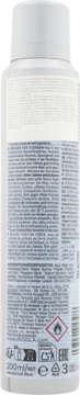 Tył białej pianki Indola mocna do włosów 200ml, widoczny drobny tekst składu i symbol łatwopalności.