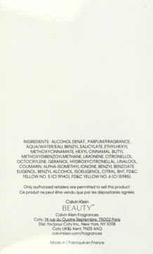 Tył opakowania perfum Calvin Klein Beauty z listą składników i danymi producenta na białym tle.