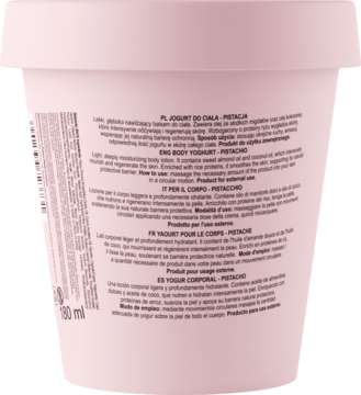Tył białego opakowania Jogurtu do ciała Fluff Superfood Pistacja z tekstem. Widok pod kątem na różowym tle.