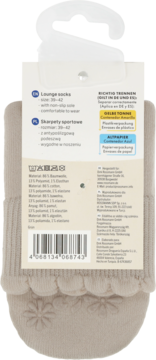Beżowe skarpetki z antypoślizgową podeszwą w kwiaty, tył opakowania z etykietą producenta i składem.