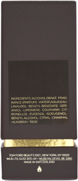 Tył ciemnego opakowania perfum Tom Ford Tobacco Vanille z widoczną listą składników i otwartą złotą wkładką.