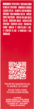 Tył czerwonego opakowania olejku Clarins Lip Comfort Oil z listą składników, kodem QR i danymi producenta.