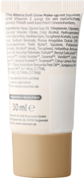 Tył białego opakowania Alterra Soft Glow Make-up 30 ml z listą składników i tekstem po niemiecku. Nawilżający podkład.