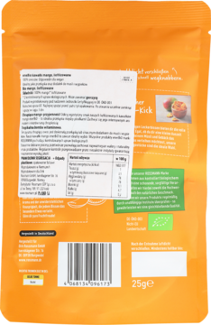 Tył pomarańczowej saszetki enerBiO liofilizowanych kawałków mango 25g, z polską etykietą i kodem.
