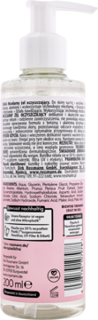 Isana Jelly Micelarny żel, tył przezroczystej butelki z białym dozownikiem, różowa etykieta, składniki.