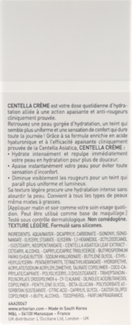 Krem Erborian Centella Crème, widok na tył opakowania z francuską listą składników i opisem działania.