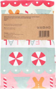 Tył opakowania świątecznych fartuchów kuchennych z motywem piernika, widoczna etykieta, kod kreskowy i instrukcje.