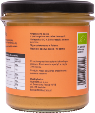 Tył słoika Ekogram BIO kremowej pasty z orzechów ziemnych 100%, pomarańczowa etykieta z PL opisem i BIO logo.