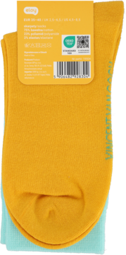 Żółte bawełniane skarpetki eloy, złożone, widoczne tył opakowania z rozmiarem, składem i certyfikatem OEKO-TEX.