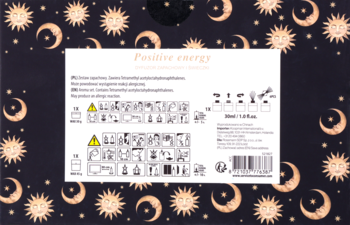 Tył opakowania "Positive energy" z motywem słońca i księżyca, białym panelem z ikonami użycia i kodem kreskowym.