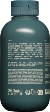 Tył ciemnozielonej butelki szamponu specjalistycznego 250ml, z opisem redukującym siwienie i składem.
