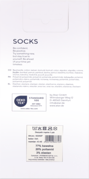 Tylna strona białego opakowania skarpetek z niebieskim napisem, logo Oeko-Tex i składem: 77% bawełna.
