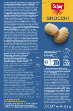 Tył opakowania Schär Gnocchi bezglutenowych z ziemniaków. Niebiesko-żółta etykieta, tabela odżywcza, skład.
