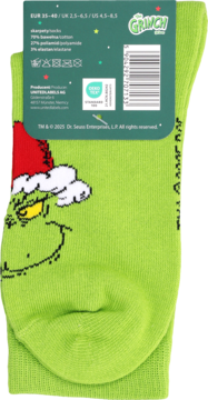 Tył zielonych skarpetek Grinch rozmiar 35-40 z grafiką twarzy Grincha i metką z informacjami o produkcie.