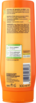 Tył pomarańczowej odżywki Isana Oil Repair 300ml, opis, skład, wegańskie info, kod kreskowy.