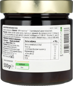 Tył słoika ekologicznego miodu leśnego enerBiO, z etykietą zawierającą tabelę wartości odżywczych.
