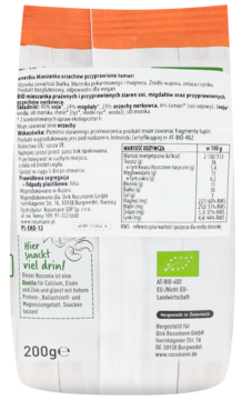 Tył białego opakowania mieszanki orzechów enerBiO 200g z pomarańczową górą, widoczne składniki i tabela odżywcza.