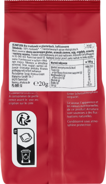 Tył czerwonego opakowania Alnatura Bio truskawki liofilizowane. Widoczna etykieta z danymi odżywczymi i składem.